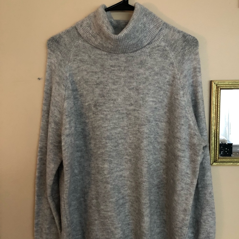 Grey tunic length turtleneck sweater